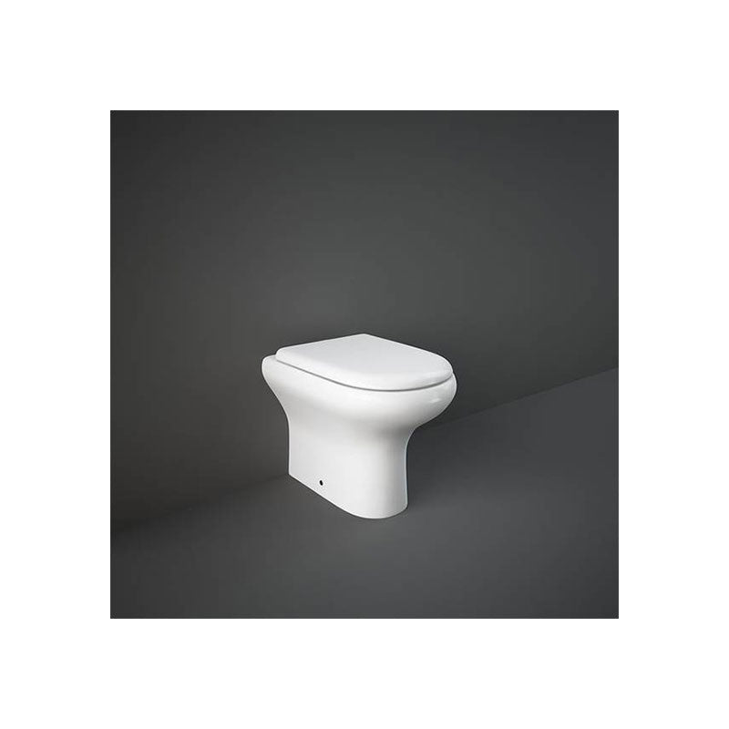 WC filo muro RAK-COMPACT bianco alpino con sedile soft close